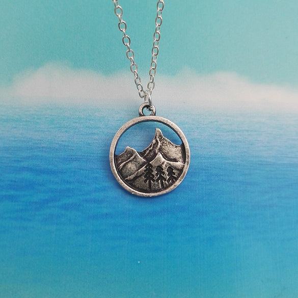 SanLan good quality camping jewelry Outdoor Jewelry Gifts Lovely round pendant Pine Tree necklace under the mountain
