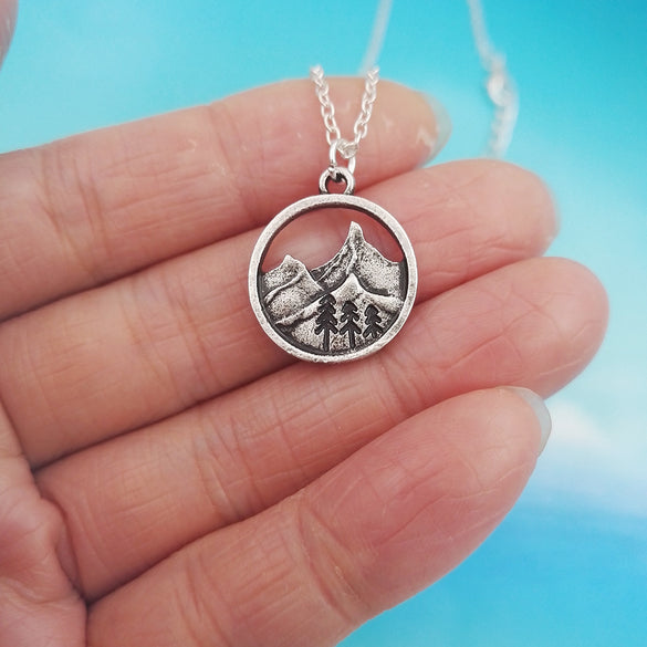 SanLan good quality camping jewelry Outdoor Jewelry Gifts Lovely round pendant Pine Tree necklace under the mountain